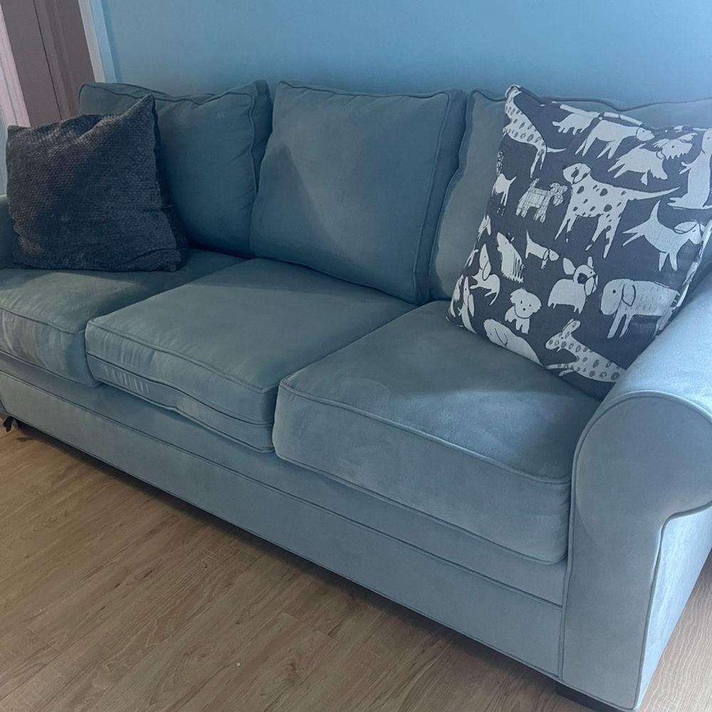 Raymour and Flanigan Large baby blue sofa and Large Wicker Mirror